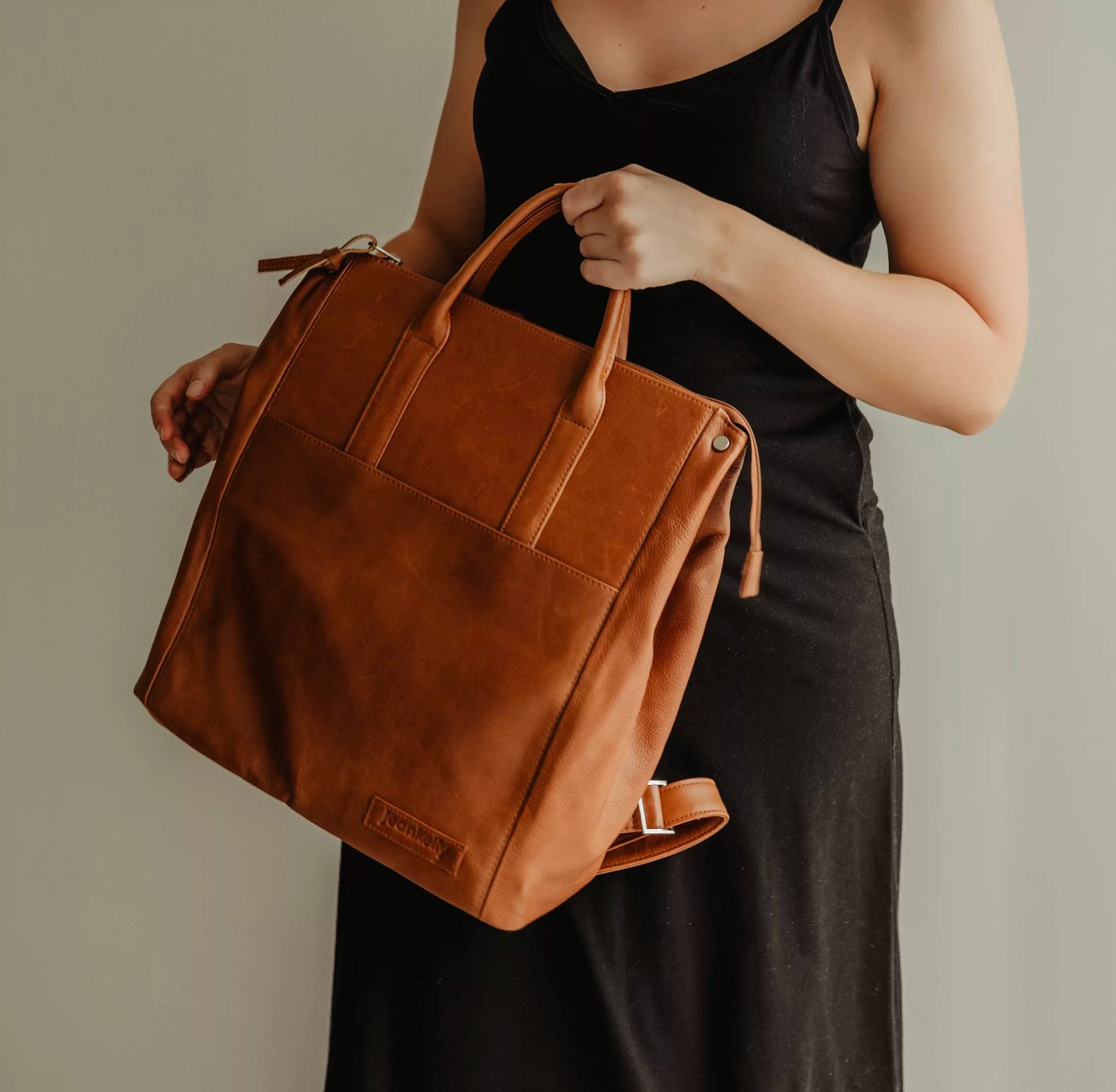 Jeankelly Leather Convertible Bag-Pack - Toffee PLUS a free beige pram pouch (valued at R550)